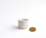 HELIOS - tealight holder in white speckled ceramic 