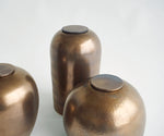 PELION – handmade urn in copper-colored metallic ceramic